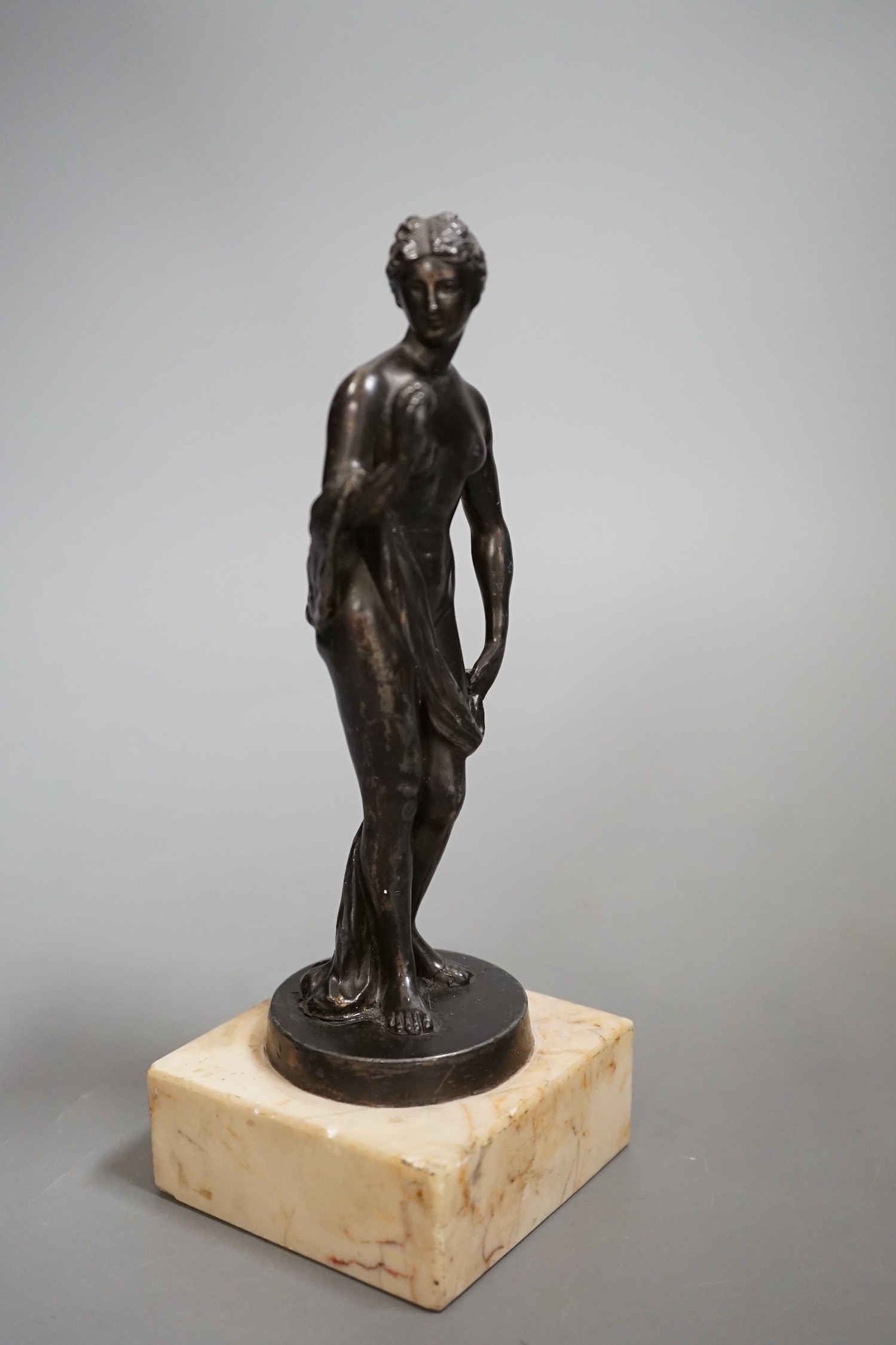 A bronzed spelter figure 'Eve', 20cm high